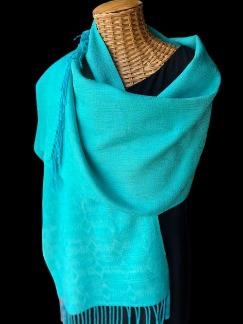 Introducing our stunning iridescent turquoise and jade handwoven silk shawl, a luxurious addition to any wardrobe. Made from 100% silk